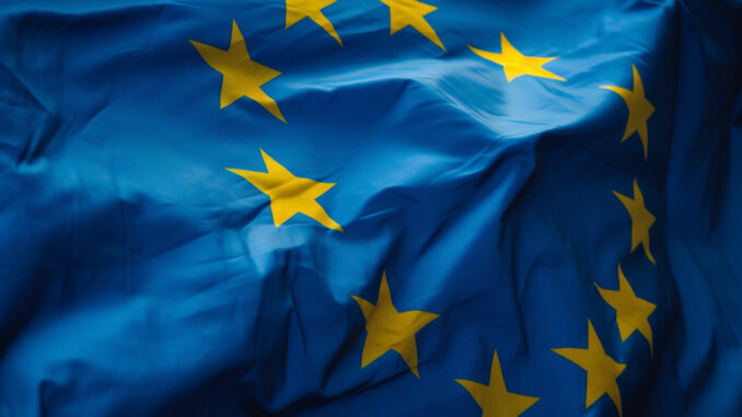 waving-flag-with-gold-stars-on-blue-2026-03-13-01-56-46-utc